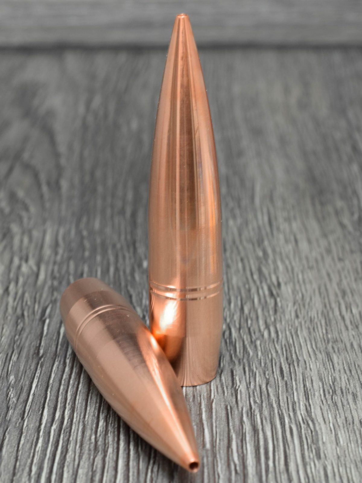 This SINGLE FEED bullet was designed for single shot loading 50BMG rifles. Our MTH line is machined out of lead free solid copper bar stock on a CNC lathe. These are a high BC